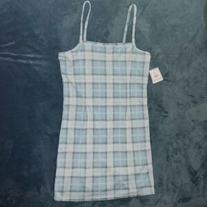 Blue and white bodycon dress with patterns